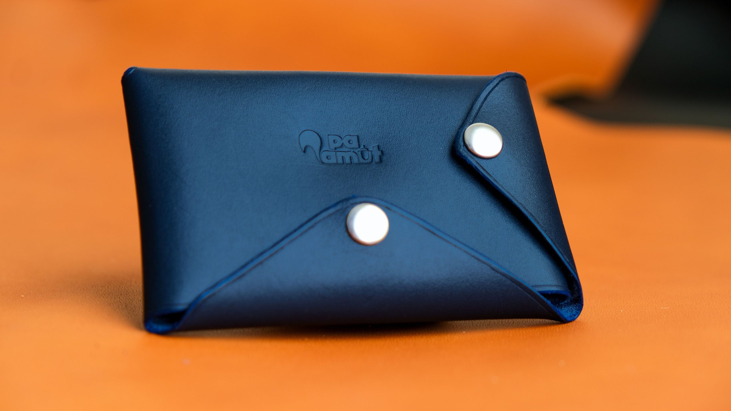 Portefeuille cuir bleu avec fermoirs pression